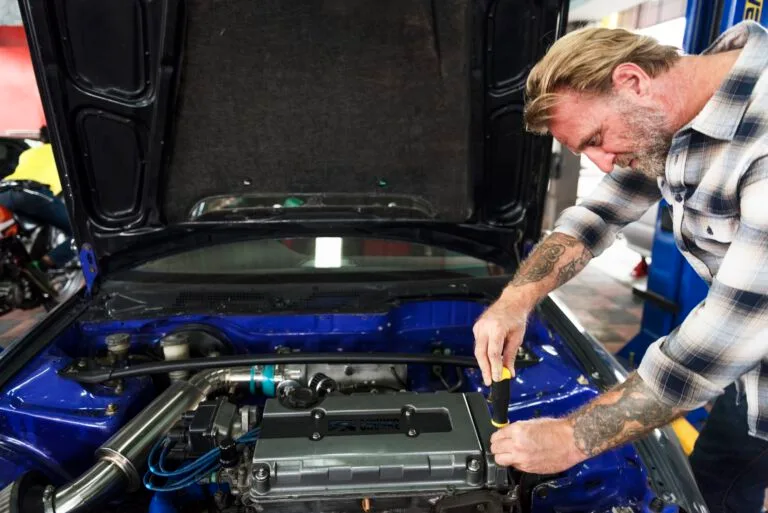 Mechanic working in the Dudley Auto Service workshop